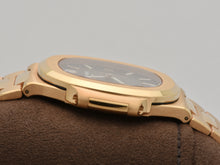 Load image into Gallery viewer, Patek Philippe Nautilus 5711/1R-001 in Red Gold