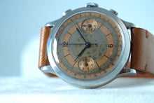 Load image into Gallery viewer, A very large stainless steel double pusher chronograph from Eberhard Case. Three-body, polished, stepped flat bezel, concave lugs, flat band, hinged snap-on case back.