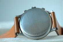 Load image into Gallery viewer, A very large stainless steel double pusher chronograph from Eberhard Case. Three-body, polished, stepped flat bezel, concave lugs, flat band, hinged snap-on case back.