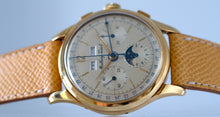 Load image into Gallery viewer, Mathey-Tissot, Triple Calendar Chronograph, Made in the 1970s. Fine, manual-winding, 18 karat yellow gold wristwatch with square button chronograph, registers, triple date and moon phases.