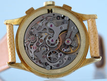 Load image into Gallery viewer, Mathey-Tissot, Triple Calendar Chronograph, Made in the 1970s. Fine, manual-winding, 18 karat yellow gold wristwatch with square button chronograph, registers, triple date and moon phases.