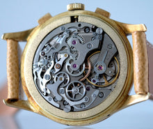 Load image into Gallery viewer, Mathey-Tissot, Triple Calendar Chronograph, Made in the 1970s. Fine, manual-winding, 18 karat yellow gold wristwatch with square button chronograph, registers, triple date and moon phases.
