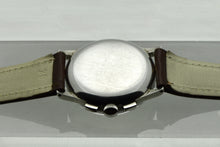 Load image into Gallery viewer, Universal Genève Tri-Compax, Ref. 22279, Steel. Made in 1940s. Fine, manual-winding, stainless steel wristwatch with square button chronograph, registers, tachymeter, triple date and moon phases.