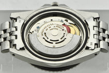 Load image into Gallery viewer, Rolex, Oyster Perpetual, GMT Master, Superlative Chronometer, Officially Certified, Ref. 1675. Made in Switzerland . Fine, two time zone, center seconds, self-winding, water-resistant, stainless steel wristwatch with date, 24-hour bezel and hand and a stainless steel Rolex riveted bracelet.