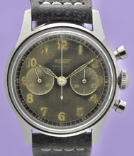 Load image into Gallery viewer, Tissot, Ref. No. 6216-3. Made in the 1950s and sold by Galli Uhren in Zürich, Switzerland. Fine, water resistant, stainless radium dial steel wristwatch with round button chronograph, registers.