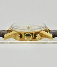 Load image into Gallery viewer, Heuer Chronograph, "Carrera, 1964 re-edition", No. 1119, Ref. CS3140 in yellow gold. Made in a numbered series circa 1996. 18 karat yellow gold, two-body, polished and brushed, flat bezel, lapidated lugs, screwed-down case back. Original signed 18 karat yellow gold buckle signed Heuer