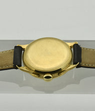 Load image into Gallery viewer, Minerva, triple calendar chronograph, made circa 1955. Case: 18 karat Gold, three-body, polished and brushed, concave lugs, inclined bezel, snap-on case back, signed Minerva.