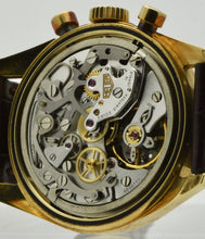 Load image into Gallery viewer, Heuer Chronograph, "Carrera, 1964 re-edition", No. 1119, Ref. CS3140 in yellow gold. Made in a numbered series circa 1996. Cal. Lemania 1873, rhodium-plated, 18 jewels, straight-line lever escapement, monometallic balance, shock absorber, self-compensating flat balance spring, index regulator.