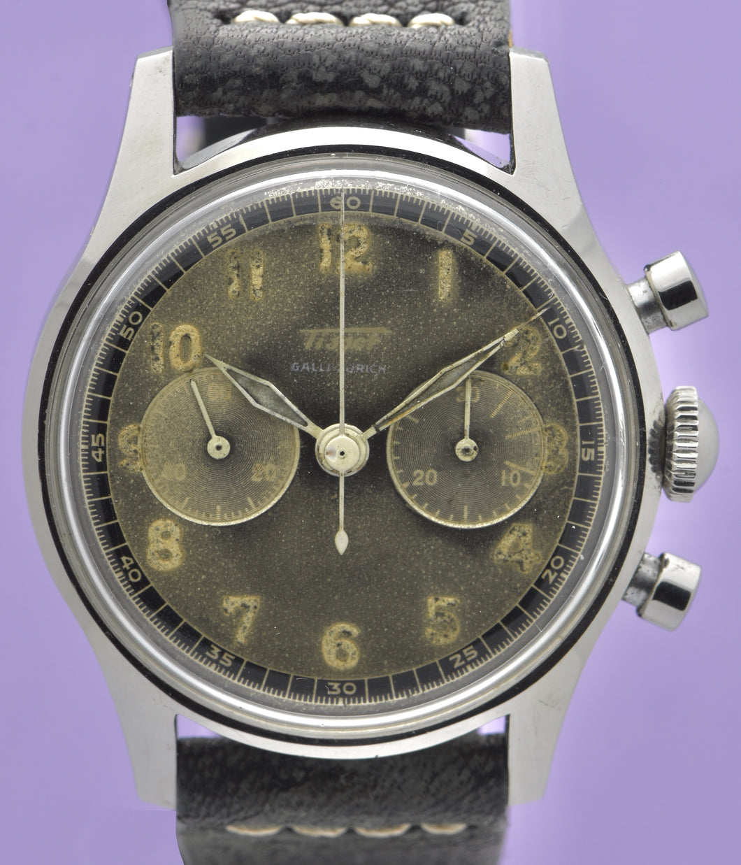 Tissot, Ref. No. 6216-3. Made in the 1950s and sold by Galli Uhren in Zürich, Switzerland.  Fine, water resistant, stainless radium dial steel wristwatch with round button chronograph, registers.