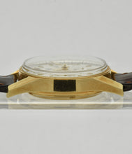 Load image into Gallery viewer, Heuer Chronograph, &quot;Carrera, 1964 re-edition&quot;, No. 1119, Ref. CS3140 in yellow gold. Made in a numbered series circa 1996. 18 karat yellow gold, two-body, polished and brushed, flat bezel, lapidated lugs, screwed-down case back.  Original signed 18 karat yellow gold buckle signed Heuer
